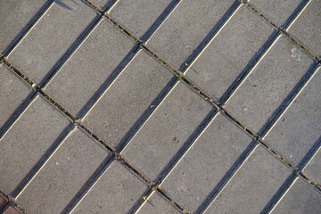 Backdrop - stack bond brick like gray concrete pavement