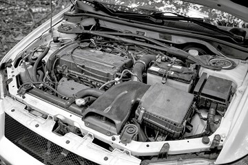 Car engine with opened hood. Car service conceptual photo