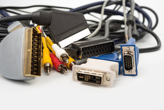 Scart and cinch electronic cables for TV and computer on a white