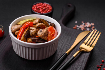 Delicious salad of grilled vegetables tomatoes, mushrooms, sweet peppers, eggplants