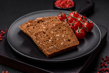 Delicious fresh crispy brown bread with seeds and grains