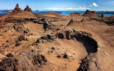 Cinder cones and craters in the ancient volcanic landscape on the island of Bartolome in the Galapagos Islands, Ecuador.