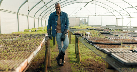 Greenhouse, agriculture and portrait of farmer with plants, smile and quality assurance in food...