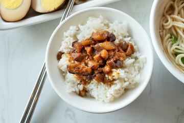 Braised meat over cooked rice, famous and delicious street food in Taiwanese restaurant.