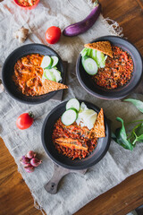 Hot plate or Sambal Gami is Traditional food from Indonesia. Served on plate with a bowl of rice...