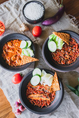Hot plate or Sambal Gami is Traditional food from Indonesia. Served on plate with a bowl of rice and vegetables top view. Super hot and spicy food