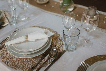 Flower decoration for celebrations. Decoration of tables and chairs. Rustic decoration.