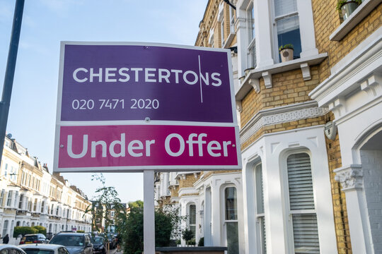 London: Chestertons Estate agent Under Offer sign on residential street in SW6 area of Fulham, south west London