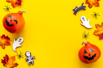 Halloween pumpkin heads and funny cookies. Halloween holiday background