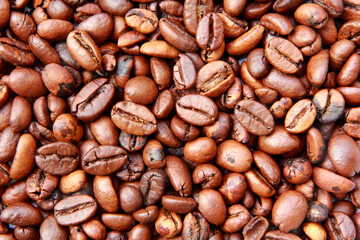 Close up roasted coffee beans background