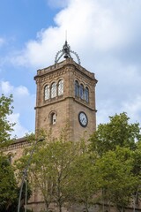 A clock tower of the historical building hosting Faculty of Philology and Communications of the University of Barcelona