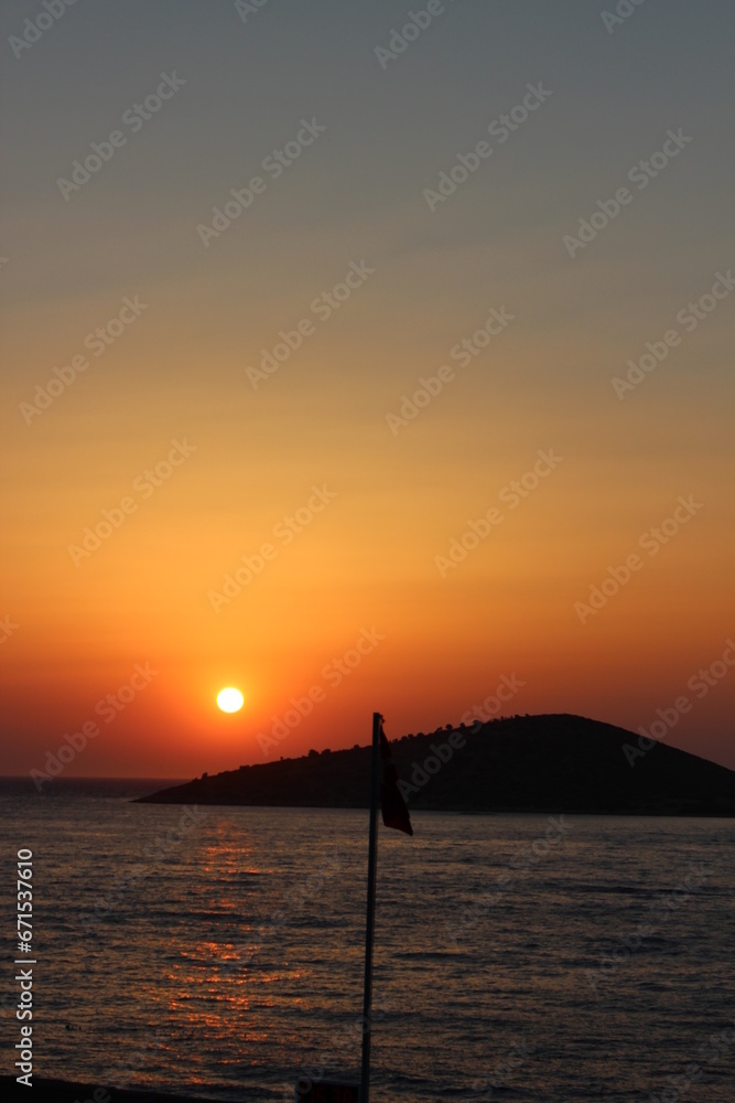 Wall mural breath taking sunset view from aegean part of turkiye, bodrum