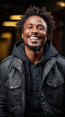 Obraz premium Handsome unshaven young dark-skinned male laughing out loud at funny meme he found on internet, smiling broadly, showing his white straight teeth. Man face portrait illustration. Generative AI