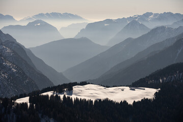 Winter view on dolomites alps in Italy.  Pinzolo in winter sunny day. Val Rendena dolomites  Italian alps, Trentino in Italy - obrazy, fototapety, plakaty
