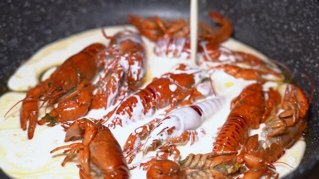 crayfish fried in a frying pan