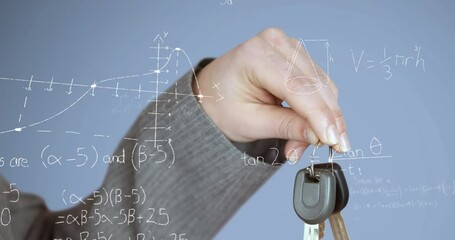 Animation of mathematical equations floating against close up of a hand hoding car keys - Powered by Adobe