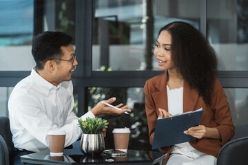 Professional investor working new start up project. Finance managers meeting.using laptop and digital tablet computer in office.
