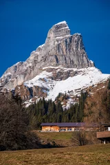 Poster de jardin  View of Braunwald in autumn with snow-capped Alps, Switzerland.  © Pixelshop