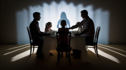 Family around dinner table with spotlight on empty chair.