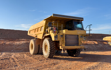 Mining truck in open-pit mining. Construction equipment on soil transport. Haul truck at...