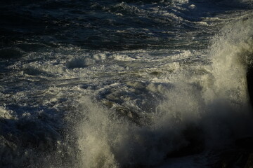 effects of waves and the ocean on the coast at sunset