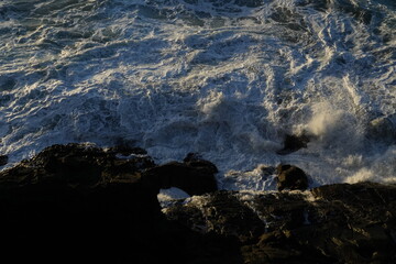 effects of waves and the ocean on the coast at sunset