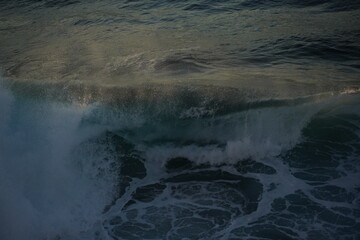 effects of waves and the ocean on the coast at sunset