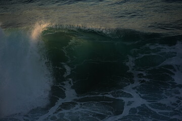 effects of waves and the ocean on the coast at sunset