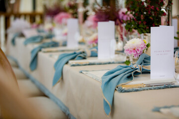 A stylish and elegant decoration with a dark navy blue color theme, prepared for the wedding...