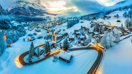 Panorama of Grindelwald at twilight in winter, Switzerland. - obrazy, fototapety, plakaty