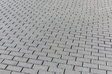 Fototapeta premium Pavement and the city. Texture, background, photo