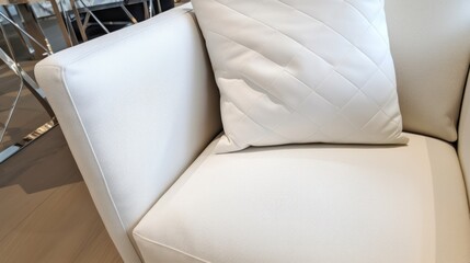 Fototapeta na wymiar Closeup of white lounge chair. Modern minimalist home living room interior. materials for furniture finishing