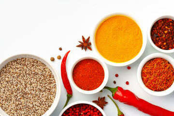 Beautiful composition with various spices on white background