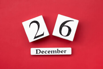 wooden calendar with date December 26 on red background Boxing Day occurs annually on December 26 - obrazy, fototapety, plakaty