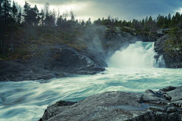 Stuttgongfossen, a powerful waterfall south of Vagamo, located at Hindsæte/Sjodalen in the region Oppland, Norway.