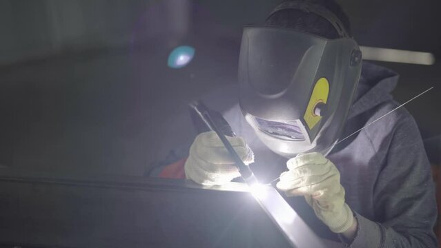 Skilled TIG Welder Crafting Precision Joints, Expert Welding Artistry in Industrial Fabrication Excellence, 4K High-Quality Footage