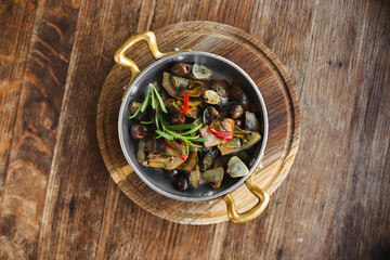 Assorted appetizers for wine, artichoke, pickled vegetables.