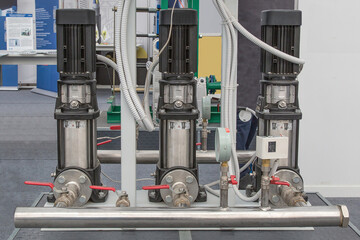 A system of three vertical circulation pumps at the exhibition stand