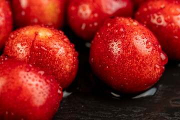delicious collected and wet cherry berries with pits