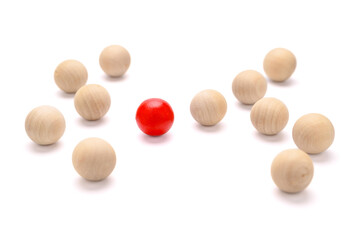 Different wooden red ball, individual, and unique concept, niche market, brand, leadership, positioning in business