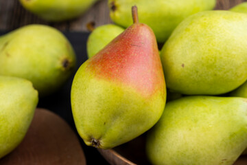 fresh harvest of pears on the table in the kitchen
