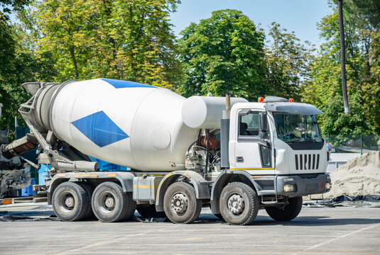 Cement truck with extended hydraulic systems turning cement