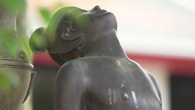 Statue of a hermit contorting herself in Wat Phra Chetuphon Vimolmangkalaram Ratchawora Mahawihan or Wat Pho.