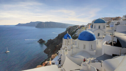 beautiful view of the blue dome of Oia in Santorini (Greece) - 671617055
