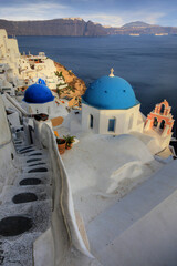 beautiful view of the blue dome of Oia in Santorini (Greece) - 671617239