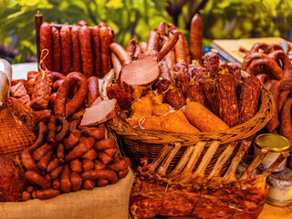 Different types of homemade smoked dry sausages