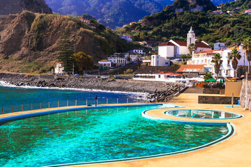 Scenic Madeira island, natural swimming pools of charming Porto da Cruz village. Popular tourist...