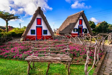 Tafelkleed Madeira island travel and landmarks. Folk Museum in Santana town. Charming traditional colorful houses with thatched roofs, popular tourist attraction in Portugal © Freesurf