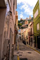 Castle view Cullera Spain from old town with narrow streets Valencian Community historic travel destination 