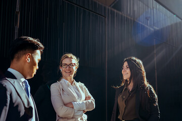 multiethnic group of business people sharing ideas for the next marketing camp in their startup